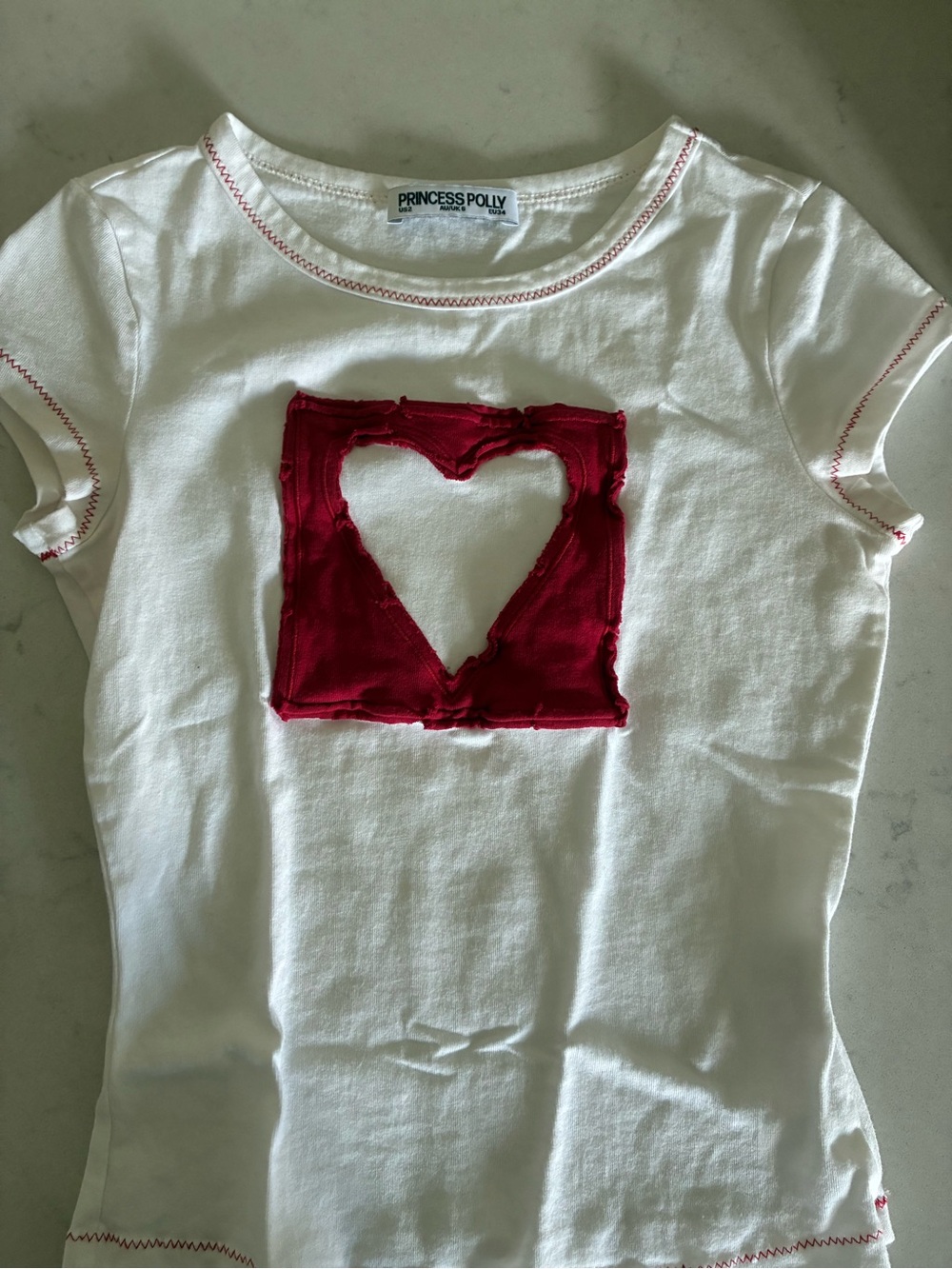 Princess Polly 'We're Lovers' baby tee ❤️